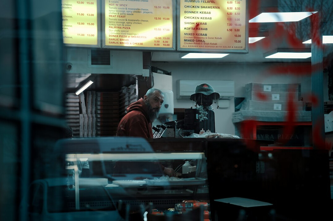 store security guard watching monitors