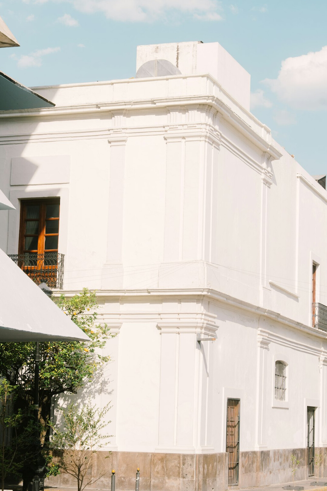 Facade of a historic colonial building in Montevideo's old town under soft evening light